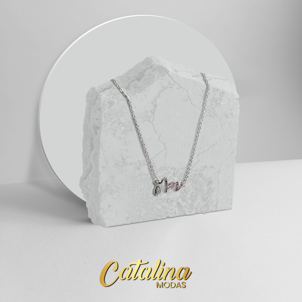 Cadena con dije Love. Acero Blanco