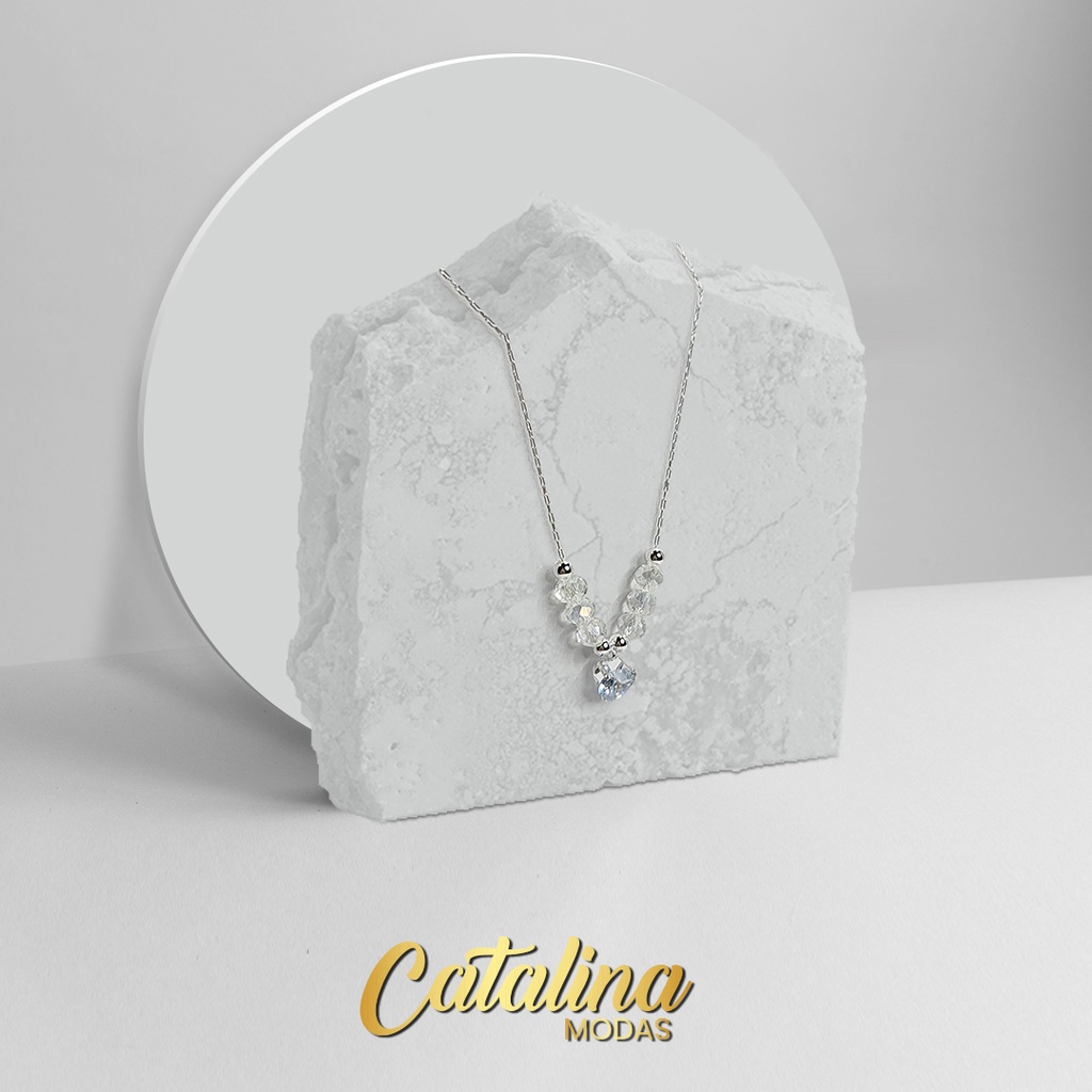 Cadena con dije de cristal. Acero blanco