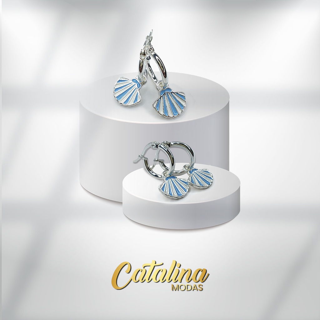 Aro con dije de ostra. Acero blanco